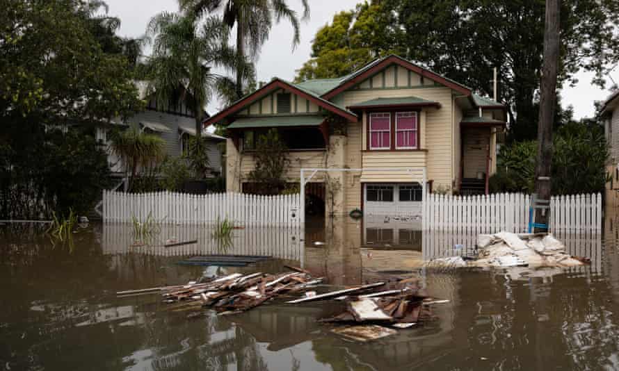 NSW flood victims missing out on federal relief because of where they live, premier says | NSW and Queensland floods 2022 1 Flood waters and debris in Lismore on 31 March. The northern rivers town was hit with devastating floods twice in a month.