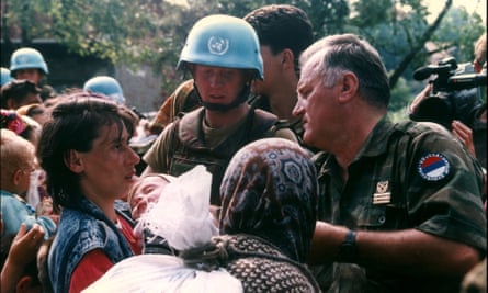 Ratko Mladic in Srebrenica on July 12, 1995. ‘He reassured panicked captive Muslim women that their loved ones would be safe at the same time his soldiers were rounding up and slaughtering 8,000 husbands and sons.’