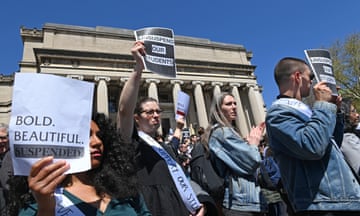 Faculty members at Columbia hold a demonstration in support of student protesters on Monday.