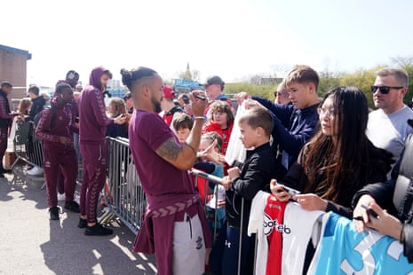 Theo Walcott and his teammates meet and greet their fans on a sunny afternoon outside St Mary’s.