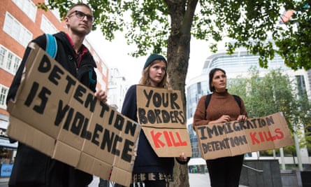 Campaigners in London protest against immigration detention.