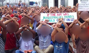 Asylum seekers protest against their detention by Australia at the Manus Island detention centre in Papua New Guinea last year