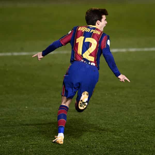 Riqui Puig celebrates his winning penalty.
