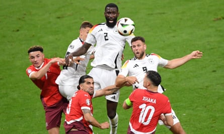 Niclas Füllkrug heads home Germany’s equaliser against Switzerland.