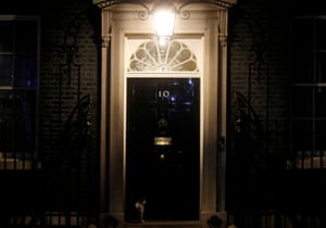 Larry the cat sits in front of 10 Downing Street, 5 April after Boris Johnson was admitted to hospital for tests