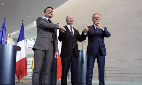 Emmanuel Macron, Olaf Scholz and Donald Tusk following a meeting at the chancellery in Berlin, 15 March 2024.