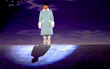 Oh Yeon-joon sings the Olympic anthem during the closing ceremony.
