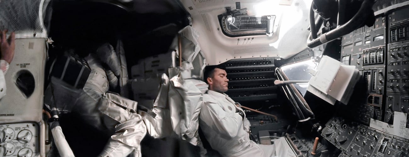 Apollo 13, April 15, 1970, astronaut Fred Hayes tries to sleep in the cold lunar module