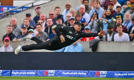 Glenn Phillips of New Zealand just fails to catch Moeen Ali of England with a spectacular dive off the bowling of Lockie Ferguson of New Zealand before getting him next delivery.