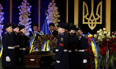 The coffin of the Ukrainian interior minister, Denys Monastyrskyi, is seen during a memorial ceremony for officials who died in a helicopter crash near Kyiv on Wednesday.