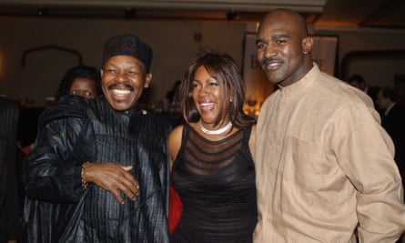 Lloyd Price, left, and Mary Wilson, of the Supremes, with the boxer Evander Holyfield.