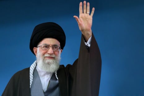 A handout picture released by the official website of the Centre for Preserving and Publishing the Works of Iran’s supreme leader Ayatollah Ali Khamenei, shows him saluting the people during a recent meeting in Tehran.