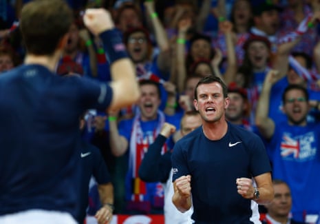 Captain Leon Smith celebrates a point as Jamie Murray and Andy Murray break back in the third.