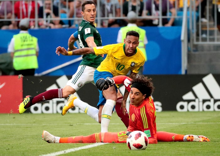 Neymar of Brazil passes the ball to Roberto Firmino for Brazil's second goal