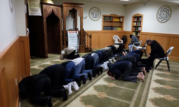 Muslim men pray at a mosque in Jersey City, New Jersey.