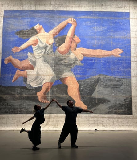 Silhouetted couple imitate the two dancing figures from the painting