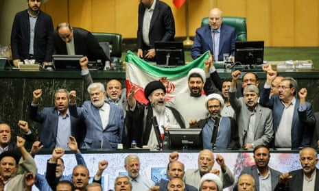Iranian lawmakers at an open session of the parliament in Tehran as it launched dozens of drones toward Israel, 14 April 2024.
