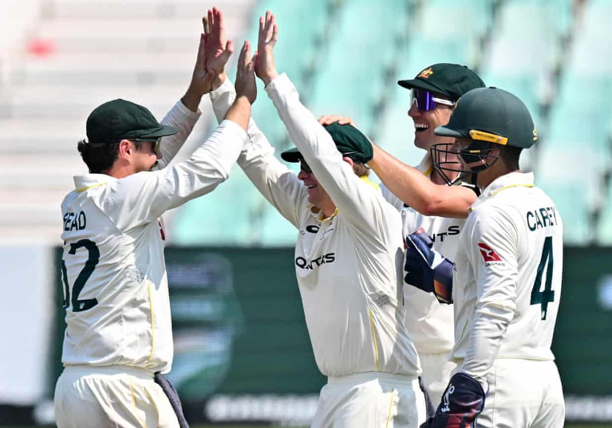 Steve Smith celebrates a catch with Australia teammates