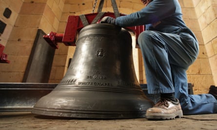 Peter Scott, a senior bell hanger for the Whitechapel Bell Foundry, manoeuvres a bell into the church of St Magnus the Martyr on 2 March 2009 in London.