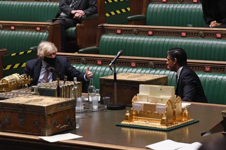 Boris Johnson congratulating Rishi Sunak at the end of Sunak’s budget speech in the Commons.