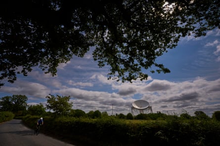 View of the Lovell telescope seen from across a field