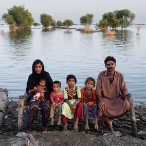 Arfa and Javed, with their four children, in the village of Jamal Khan.