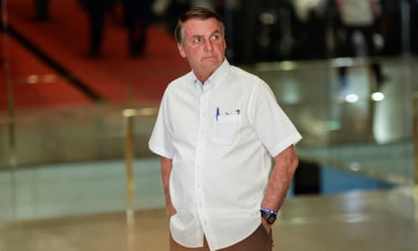 Brazil's President and candidate for re-election Jair Bolsonaro arrives to a news conference at the Alvorada Palace in Brasília on Wednesday.