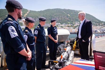 Carns speaks to sailors on deck