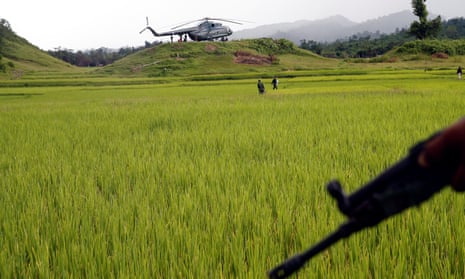 A Myanmar army helicopter is seen in September 2017 after transporting journalists to an area where the bodies of Hindu villagers were found near Maungdaw in the north of Myanmar’s Rakhine state, September 27, 2017.