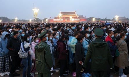 Watch the flag-raising ceremony at Tiananmen Square in Beijing.
