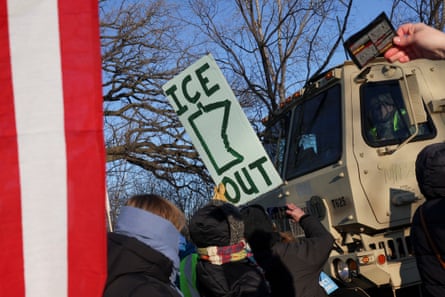 a person holding a sign