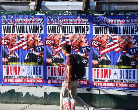 Donald Trump v Joe Biden billboard on a New York street advertising Polymarket