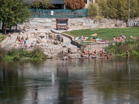 Bathers at the River Miño and the A Chavasqueira hot springs in Ourense.