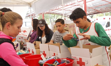 Young volunteers sort medicines and supplies at a collection centre in Mexico City on Friday.