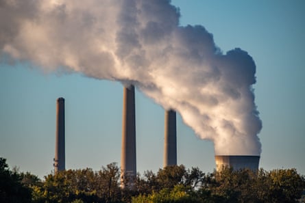 Thick plumes of pollution and steam rise from the stacks of the Miami fort power station, near Cincinnati, US.