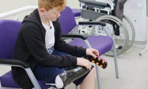 Ben Moore tries on his race blade.