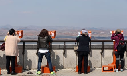 Tourists in South Korea look into the North from the border city of Paju.