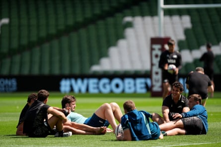 Argentina players lie on the pitch at the Aviva Stadium