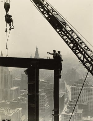 Derrick and workers on girder, Empire State Building, 1930-31 In Hine’s vertiginous series of photos of the Empire State Building’s construction, he shot men performing perilous tasks perched on beams and hanging from wires. Times’ art critic Ken Johnson once wrote the photographs reflect Hine’s ‘romantic belief in the possibilities of America’