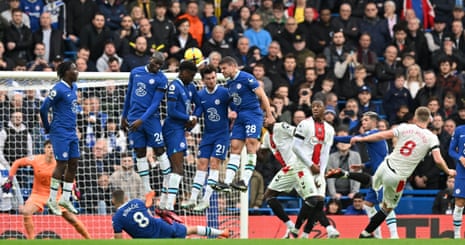 James Ward-Prowse’s shot clears the Chelsea wall to give the Saints the lead at Stamford Bridge.