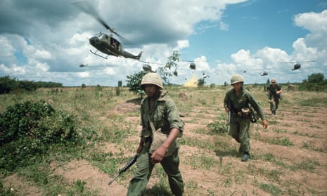 Tim Page’s photograph of soldiers from the US 173rd Airborne Brigade supported by helicopters during the Iron Triangle assault in Vietnam, 1965.