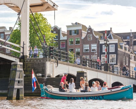 Young women on a boat in Amsterdam