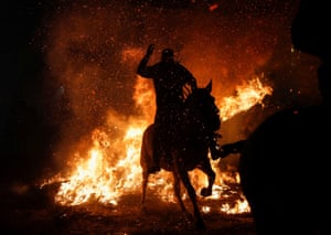A horse and rider go through the flames