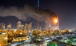 Smoke spreads across Dubai from the hotel fire.