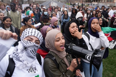 protesters chanting during a rally