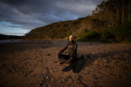 Stewart in the first light of dawn at his favourite beach, Burrewarra Point, NSW.