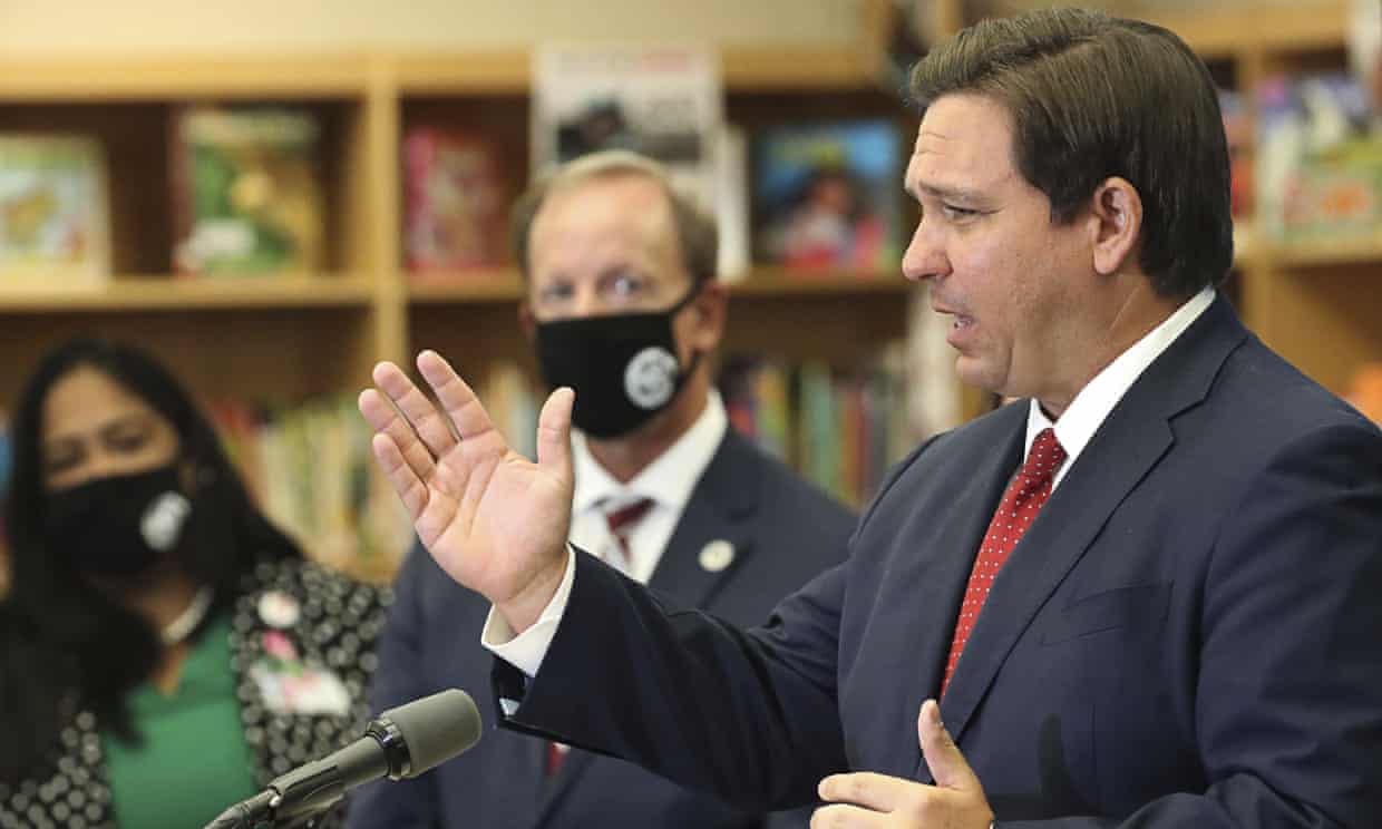 Florida Governor Ron DeSantis holds a press conference on 30 November 2020. Photograph: Ricardo Ramirez Buxeda/AP