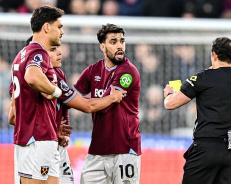 Lucas Paquetá (No 10) is shown his second yellow card for dissent in the defeat against Liverpool