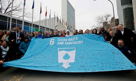 Australian water scarcity activist Mina Guli, center, after completing her 200th marathon outside UN headquarters on 22 March 2023.