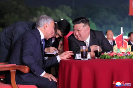 Kim Jong-un and Russia’s Vyacheslav Volodin speak as they watch a performance commemorating the 80th anniversary of the country’s liberation from Japan’s colonial rule.